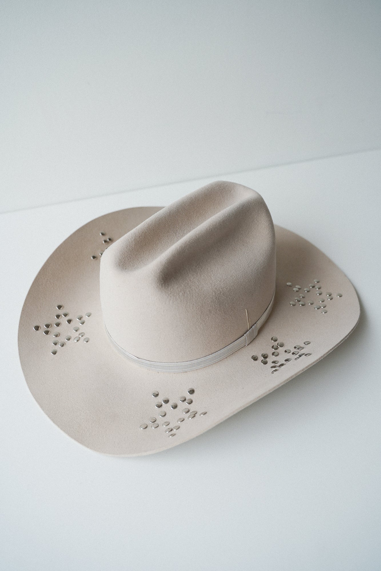 Beige fur felt cowboy hat with studs handmade in Stockholm
