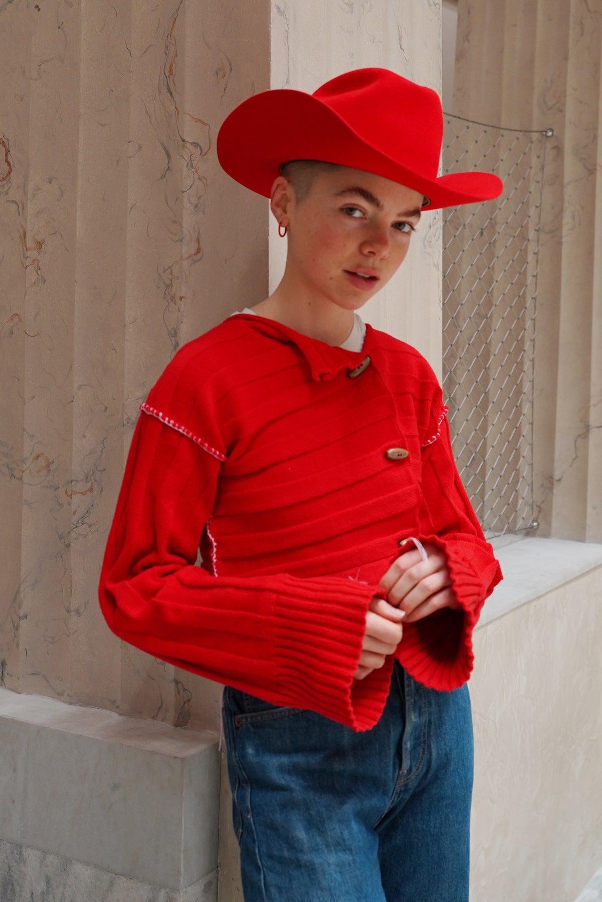 Unisex custom made red felt cowboy hat with a wide brim and center crease, handcrafted by SoonNoon in Stockholm
