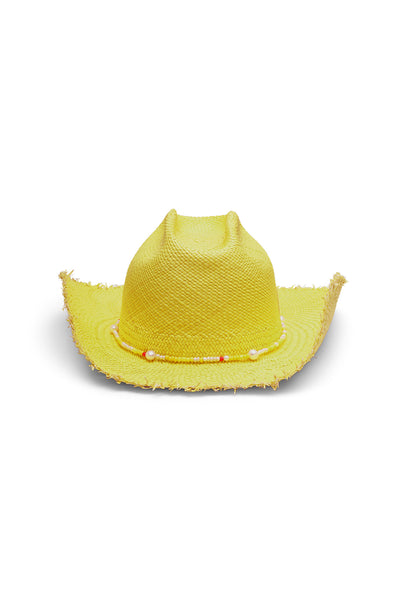 Unisex yellow cowboy straw hat with a wide, flanged brim, frayed edges, and center crease. Seed beads and saltwater pearls detail, handcrafted by SoonNoon in Stockholm