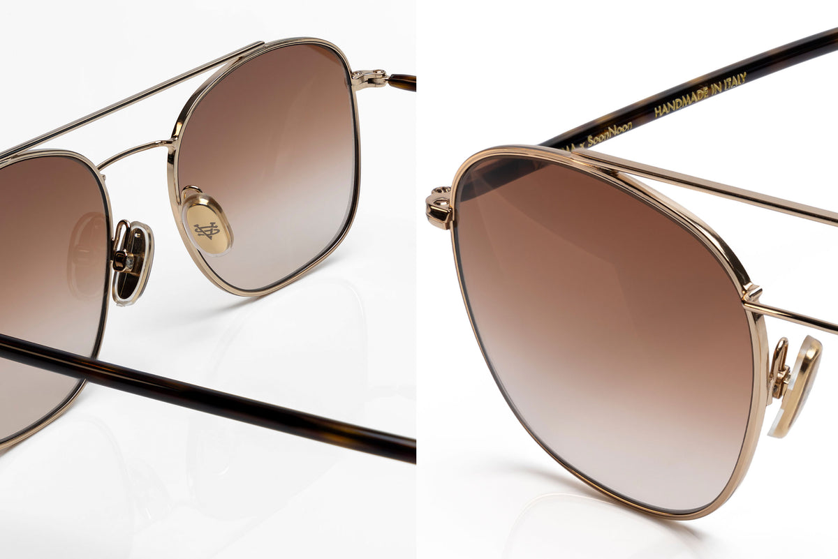 Close-up views of a pair of oversized square sunglasses with a gold-toned double bridge frame, brown gradient lenses, and dark temples on a white background.