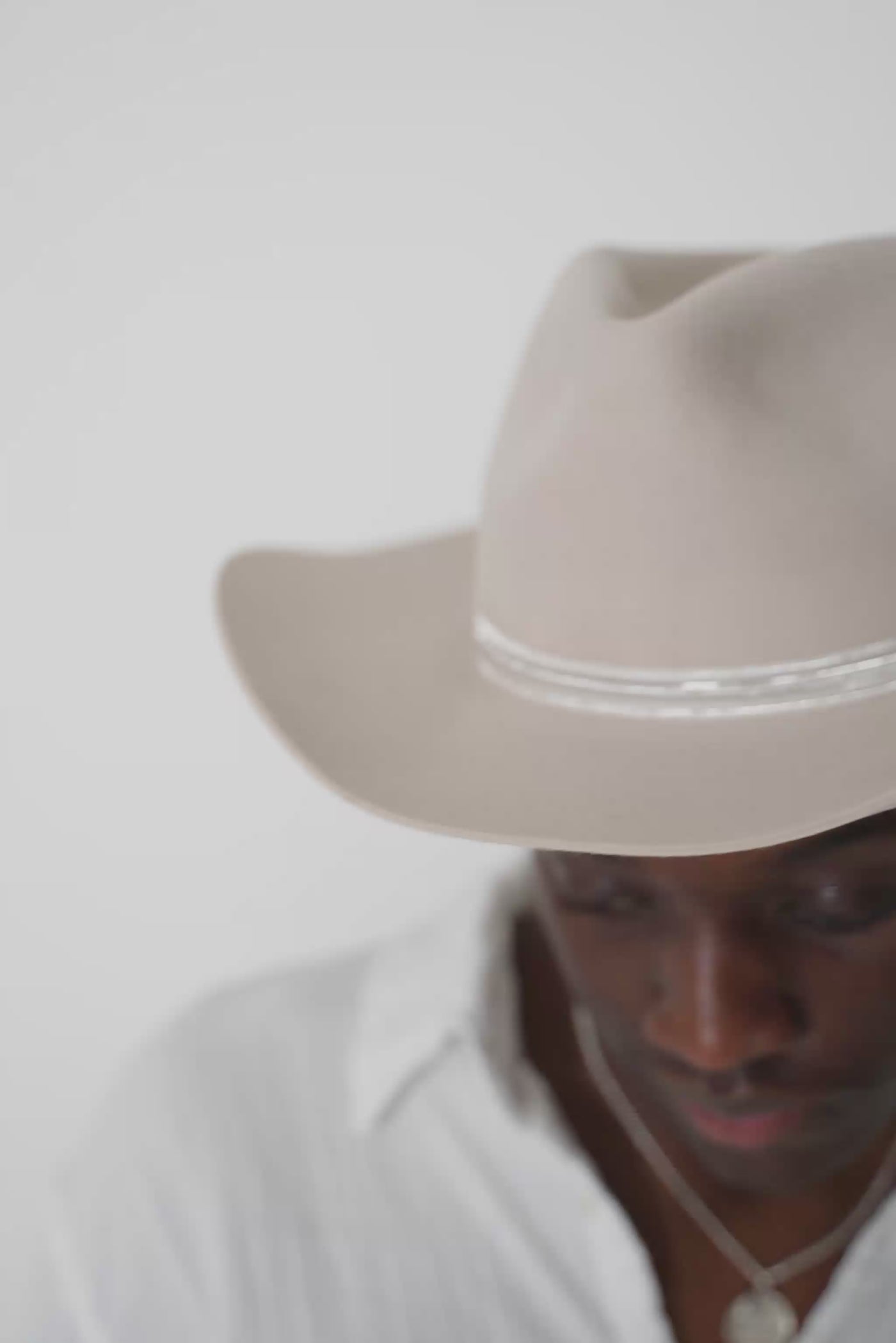 Beige cowboy hat with a fedora crease, handcrafted by SoonNoon in Stockholm