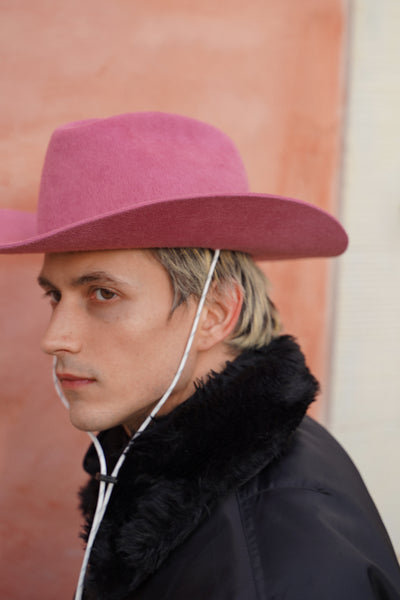 Pink cowboy in 100% velour fur felt hat with a wide brim and center crease. Unisex hat style in various sizes and colors. We ship worldwide. Shop now. Each SoonNoon hat is handmade with unique character in Stockholm, Sweden.
