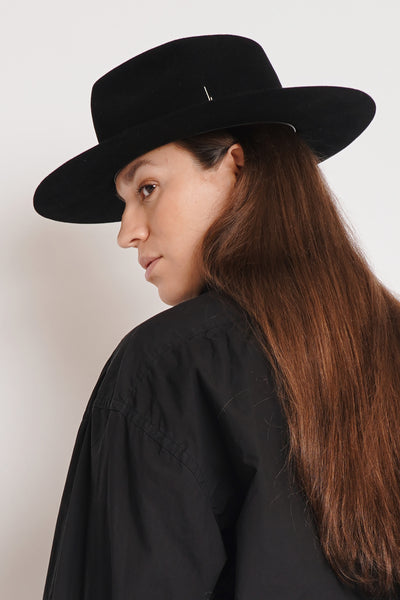 Unisex black fur felt fedora hat with a wide brim, black ribbon and tear drop crown, handcrafted by SoonNoon in Stockholm