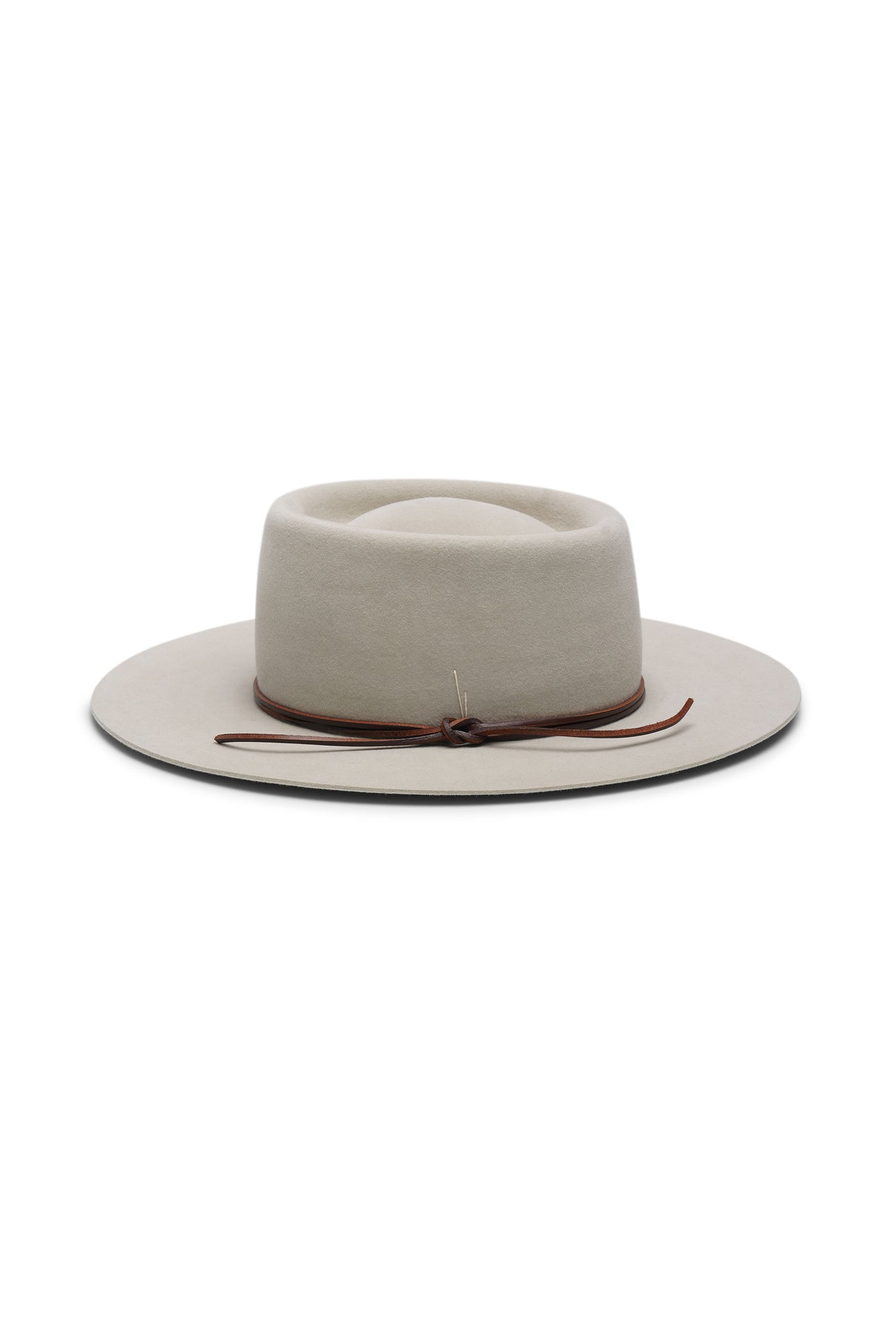 Beige bolero fur felt hat with a wide brim and telescope crown. Unisex hat style in various sizes and colors. We ship worldwide. Shop now. Each SoonNoon hat is handmade with unique character in Stockholm, Sweden.