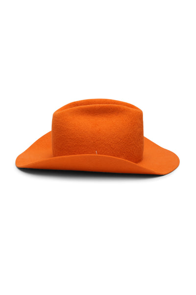 Orange cowboy 100% velour fur felt hat with a wide brim and center crease. Unisex hat style in various sizes and colors. We ship worldwide. Shop now. Each SoonNoon hat is handmade with unique character in Stockholm, Sweden.